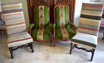 three green chairs with striped upholstered seats in a living room