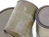 two tins that are sitting next to each other