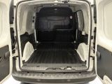 the back of a white van with the doors open
