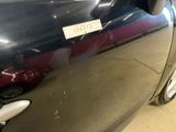 a car that has a sticker on the side of it