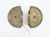 pair of brass plated bookends on white background