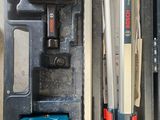 a box with tools in it sitting on the floor