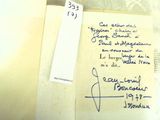 a piece of paper with writing on it sitting on a table