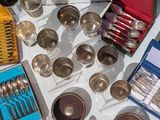 a table with silverware and silverware on it