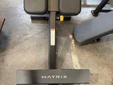 the gym equipment is sitting on the floor in the room