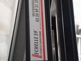 a sticker on the window of a bus