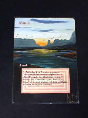 a card with a picture of a sunset on it