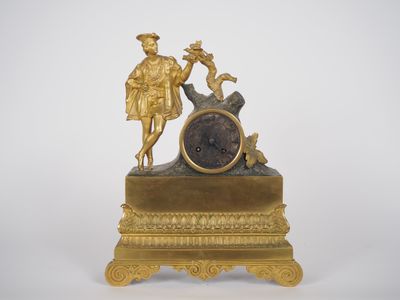 Pendule de cheminée Restauration en bronze patiné et doré, à…