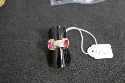 a ring that is sitting on a table next to a price tag