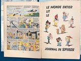an open book with a picture of people on it