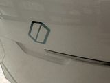a close up of a car with a sticker on the front of it