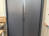two doors that are open in a room