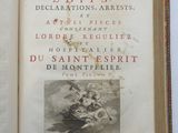 an open book with a picture of a man on a horse in it