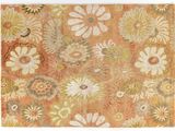 un gros plan sur un tapis orné de fleurs
