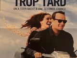 une affiche représentant un homme et une femme à moto