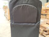 the back of a suit case sitting on top of a pallet in a warehouse