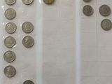 a lot of coins that are on the table