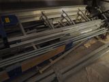 a lot of metal pipes that are sitting in a room