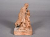 statue of a woman holding a child on a marble base