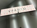 a picture of a sticker with the word vauto on it