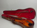 an image of a violin in a case on a white background