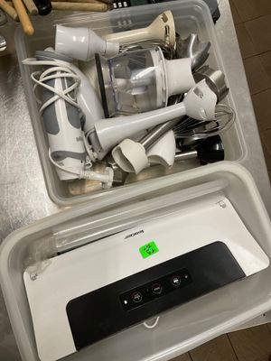 a lot of items that are in a container on the counter