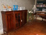 an image of a living room with wood floors and wallpaper