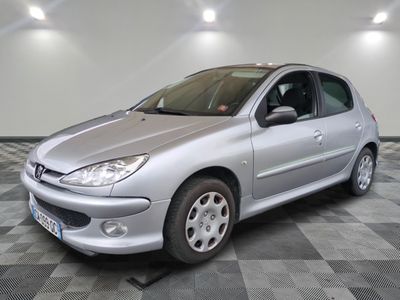 a picture of a silver car parked in a garage