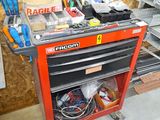 a red workbench with tools on it in a garage