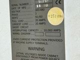 an image of a metal sign on the side of a building