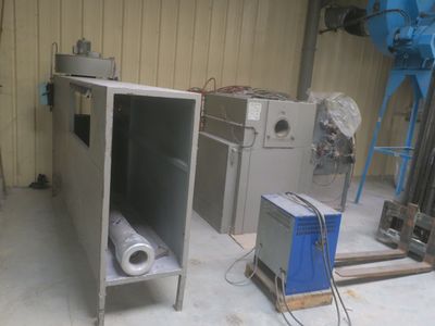 two machines that are sitting in a room