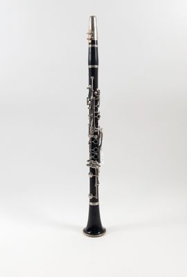 a close up of a clarinet on a white background