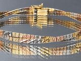 bracelet bicolore or et argent avec un fermoir carré