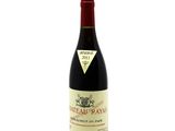 an image of a bottle of wine sitting on top of a table