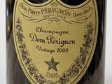 a bottle of champagne with a gold label on it
