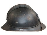 a helmet that is sitting on a white surface