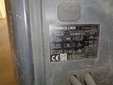 a close up of a metal device with a label on it