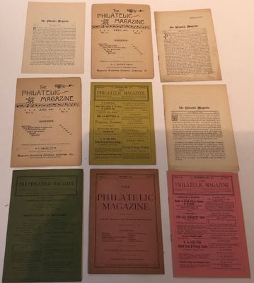 several old books are arranged on a table in a row