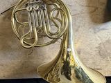 a brass instrument that is sitting on a table