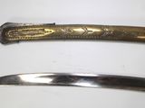 two knives that are sitting on a table
