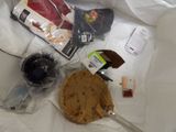 a lot of items that are laying out on the bed