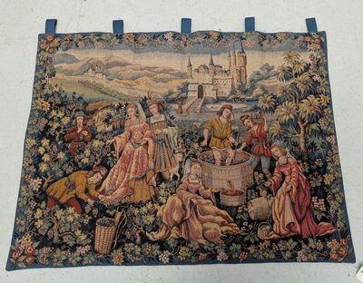 a tapestry hanging on the wall of a room