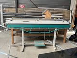 a table that has a lot of glass on it