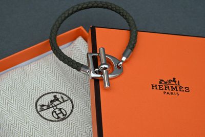 an orange box with a keychain and an orange box with a keychain