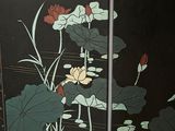 a picture of a room divider with a painting on it