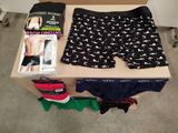 a box of underwear and a pair of underwear on a table