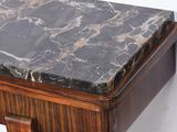 a marble top on a wooden shelf on a white wall