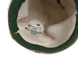 a close up view of a vase with a flower on it