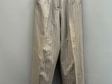 a close up of a pair of pants hanging on a wall