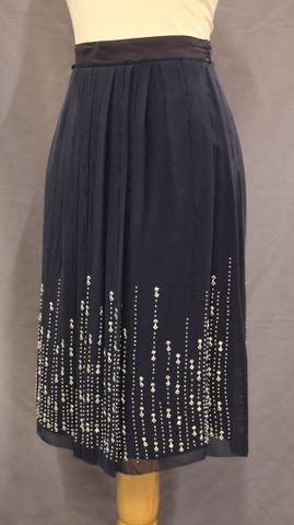 ARMAND VENTILO – Jupe en soie. Taille : 38